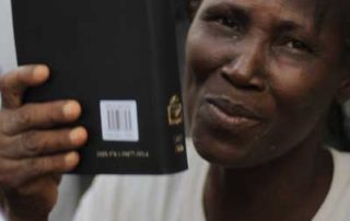 Hatian-women-gets-bible-after-receiving-Christ-and-praises-God-for-new-bible
